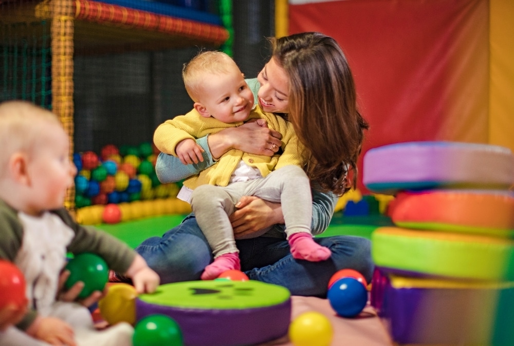 Mother and toddler playing in the ball pit at Captain Kids Adventure World, a top indoor activity in Skegness for young children