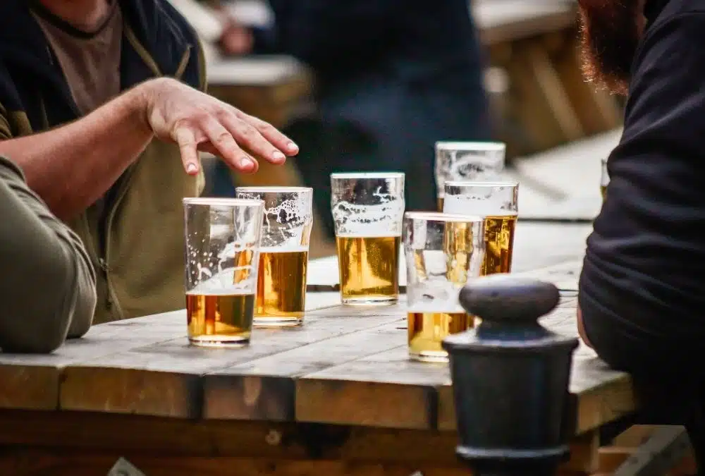 Pints of beer on an outdoor table at a dog friendly pub near Ingoldmells
