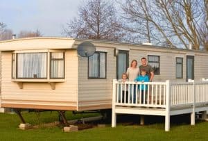 Family enjoying the benefits of owning a static caravan on a UK holiday park