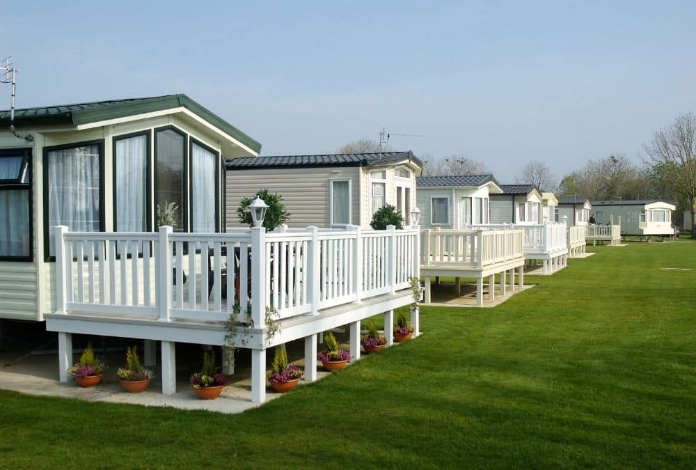 Modern static caravans on a holiday park showing the benefits of owning a static caravan