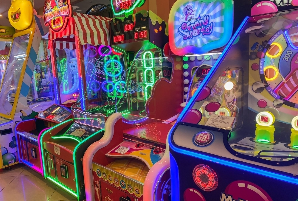 Neon-lit ticket arcade games lined up inside an amusement arcade If it’s your own photo of Lucky Strike, use this instead: Ticket arcade games inside Lucky Strike amusement arcade on Grand Parade, Skegness