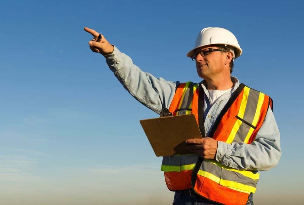 Site inspector carrying out a compliance inspection relating to static caravan ownership requirements