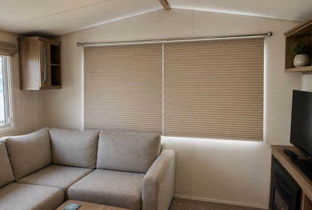 Thermal blinds closed in a caravan living room to block summer heat
