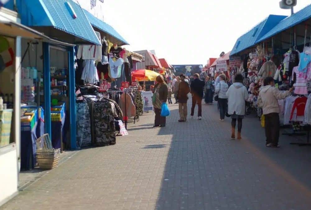 Shoppers walking through Fantasy Island market near Skegness