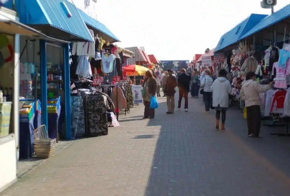 Shoppers walking through Fantasy Island market near Skegness