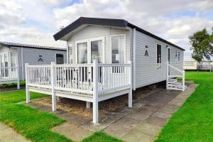 Caravans Skegness Exterior of Premium Plus 3 Bedroom Caravan with elegant steps and decking, offering convenient access and stylish outdoor space.