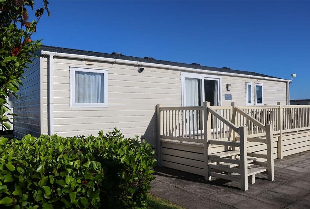 Holiday caravan at Kingfisher Caravan Park near Skegness arcade attractions and seafront