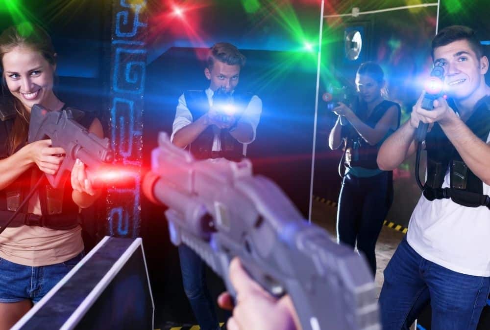 Family playing laser tag in Skegness indoor arena, an exciting group activity and top thing to do in Skegness