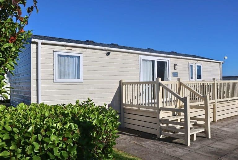 Static caravan with decking, used in a first-time buyer guide to buying a static caravan