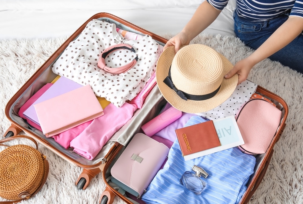 Clothing and travel essentials packed for a caravan holiday in the UK