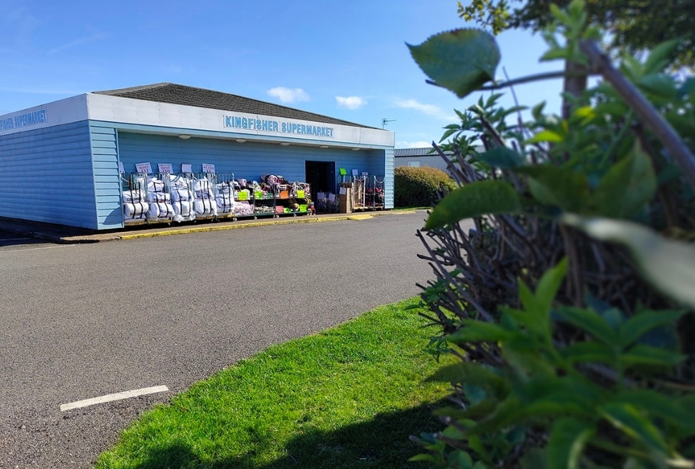 Exterior of Kingfisher Supermarket, the on-site shop at Kingfisher Caravan Park in Ingoldmells
